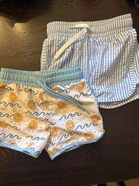 2 pairs of Caden Lane Swim Trunks